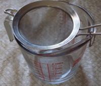 measuring cup and strainer